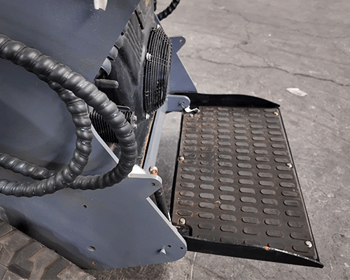 Carregador de rastos compacto